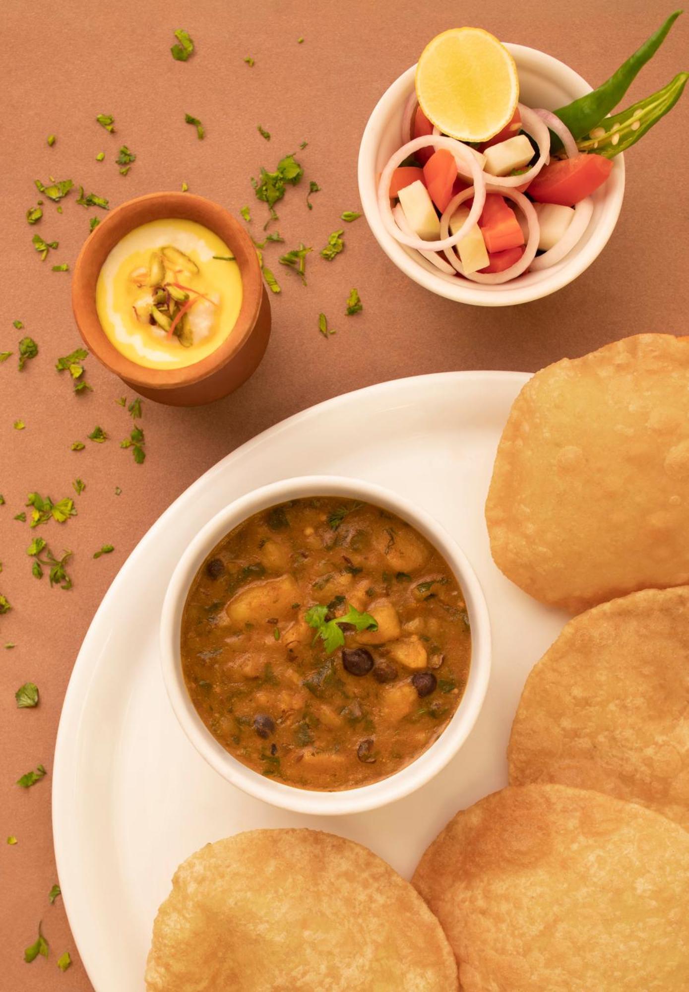 타지 갠지스, 바라나시 외부 사진 Poori masala